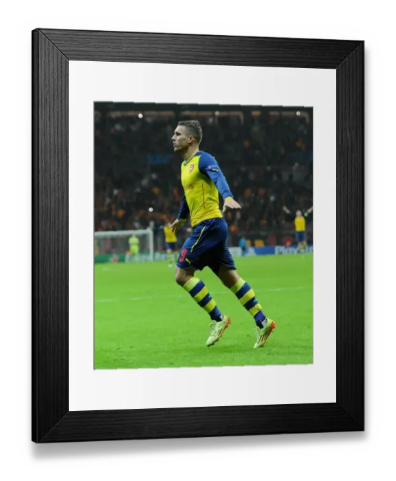 Framed Print : Lukas Podolski Scores Double: Arsenal's Victory Over Galatasaray in UEFA Champions League, Istanbul 2014