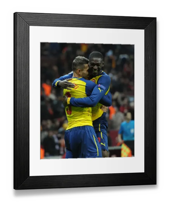 Framed Print : Podolski and Sanogo's Double Strike: Galatasaray vs. Arsenal, UEFA Champions League, Istanbul, 2014