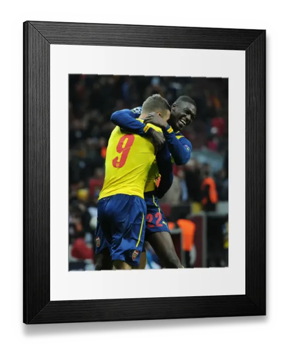 Framed Print : Podolski and Sanogo's Double Strike: Arsenal's Victory Over Galatasaray in Istanbul