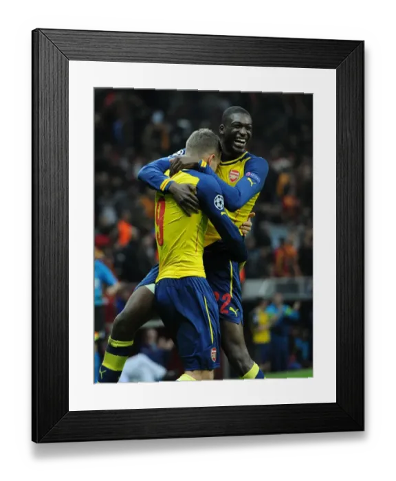 Framed Print : Podolski and Sanogo Celebrate Goals: Galatasaray vs. Arsenal, UEFA Champions League, Istanbul, 2014