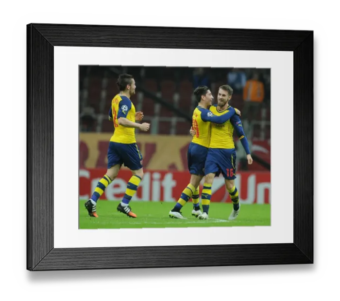 Framed Print : Ramsey and Bellerin Celebrate Arsenal's Champions League Goals Against Galatasaray (2014)