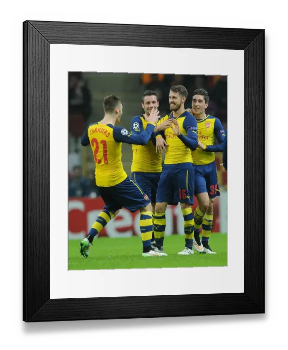 Framed Print : Arsenal's Triumph: Ramsey, Bellerin, Debuchy, and Chambers Celebrate Goals Against Galatasaray in Champions League Framed Print : Arsenal's Triumph: Ramsey, Bellerin, Debuchy, and Chambers Celebrate Goals Against Galatasaray in Champions League