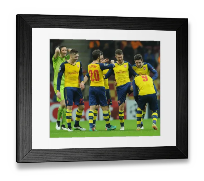 Framed Print : Ramsey and Podolski Celebrate Arsenal's Champions League Goals Against Galatasaray Framed Print : Ramsey and Podolski Celebrate Arsenal's Champions League Goals Against Galatasaray