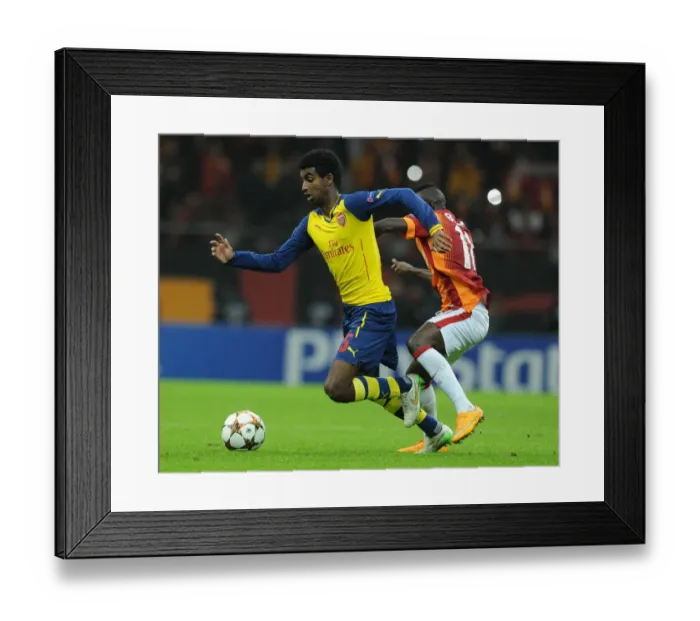 Framed Print : Zelalem Dodges Bruma: Thrilling Moment from Galatasaray vs. Arsenal UEFA Champions League Clash