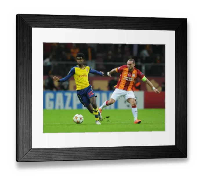 Framed Print : Young Gun Zelalem Outsmarts Veteran Sneijder: Arsenal's Rising Star Shines in UEFA Champions League Showdown against Galatasaray Framed Print : Young Gun Zelalem Outsmarts Veteran Sneijder: Arsenal's Rising Star Shines in UEFA Champions League Showdown against Galatasaray