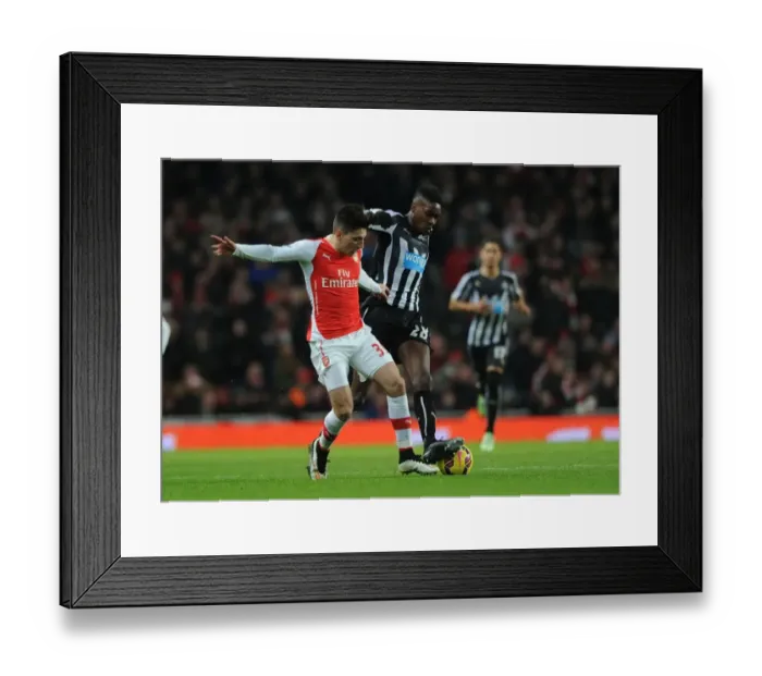 Framed Print : Arsenal vs Newcastle United: Hector Bellerin vs Sammy Ameobi - Premier League Clash at Emirates Stadium Framed Print : Arsenal vs Newcastle United: Hector Bellerin vs Sammy Ameobi - Premier League Clash at Emirates Stadium