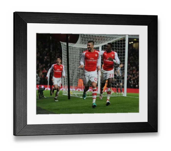 Framed Print : Arsenal: Giroud and Welbeck Celebrate Goals Against Newcastle United (2014 / 15)