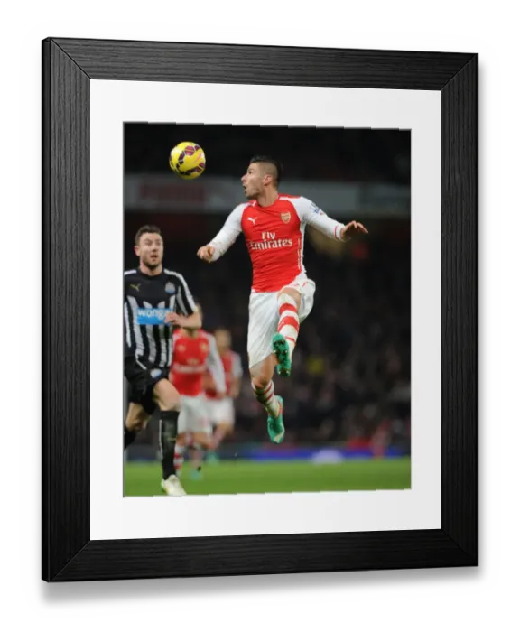 Framed Print : Arsenal's Olivier Giroud in Action against Newcastle United - Premier League 2014 / 15 Framed Print : Arsenal's Olivier Giroud in Action against Newcastle United - Premier League 2014 / 15