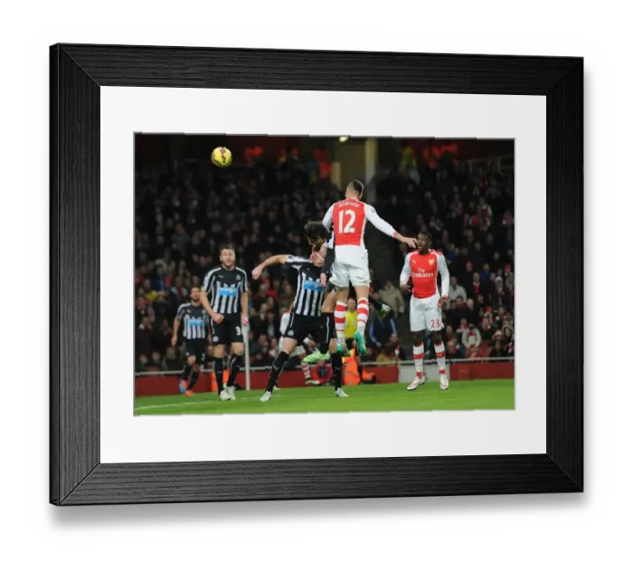 Framed Print : Giroud's Last-Minute Strike: Arsenal Edge Newcastle in Premier League Thriller