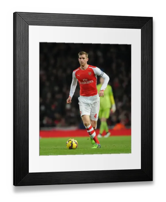 Framed Print : Arsenal vs Newcastle United: Per Mertesacker in Action at the Emirates Stadium (2014 / 15) Framed Print : Arsenal vs Newcastle United: Per Mertesacker in Action at the Emirates Stadium (2014 / 15)
