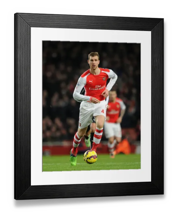 Framed Print : Per Mertesacker in Action: Arsenal vs Newcastle United, Premier League 2014 / 15