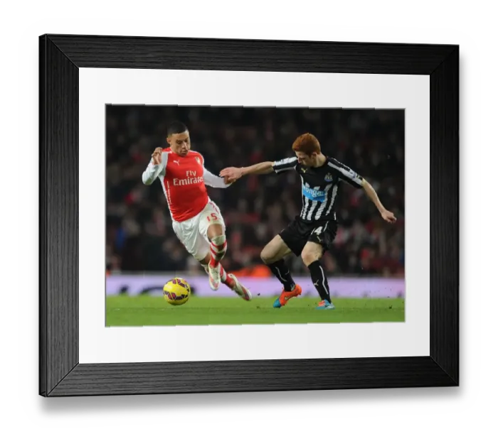 Framed Print : Oxlade-Chamberlain vs Colback: A Football Battle in the Arsenal vs Newcastle United Premier League Clash (December 2014) Framed Print : Oxlade-Chamberlain vs Colback: A Football Battle in the Arsenal vs Newcastle United Premier League Clash (December 2014)