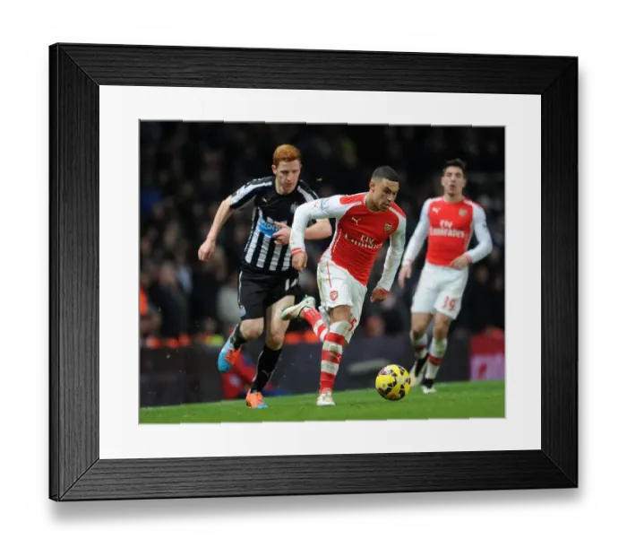 Framed Print : Oxlade-Chamberlain vs. Colback: A Fight for Supremacy in the Arsenal vs. Newcastle United Clash Framed Print : Oxlade-Chamberlain vs. Colback: A Fight for Supremacy in the Arsenal vs. Newcastle United Clash