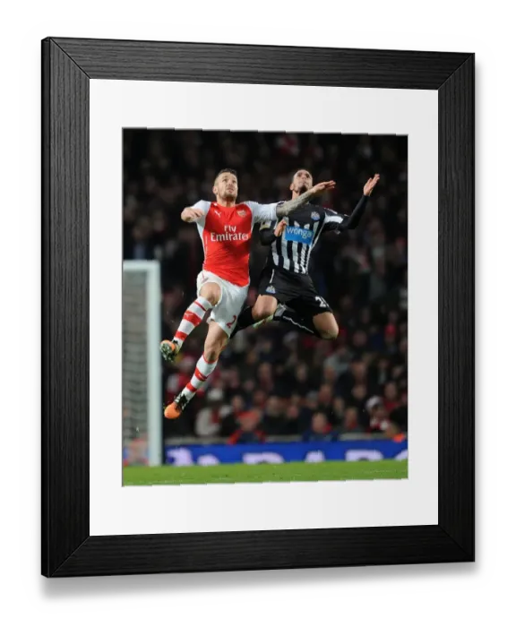 Framed Print : Arsenal vs. Newcastle United: Debuchy vs. Riviere Clash in Premier League Showdown
