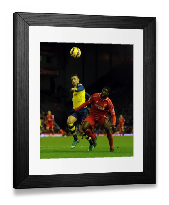 Framed Print : Clash of the Reds: Giroud vs. Toure - A Premier League Rivalry: Arsenal's Giroud Faces Off Against Former Teams's Toure at Anfield Framed Print : Clash of the Reds: Giroud vs. Toure - A Premier League Rivalry: Arsenal's Giroud Faces Off Against Former Teams's Toure at Anfield