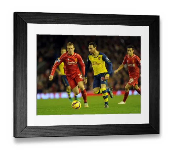 Framed Print : Cazorla Breaks Past Lucas: Intense Battle between Liverpool and Arsenal in the Premier League (2014 / 15)