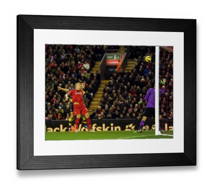 Framed Print : Debuchy Soars Above Skrtel: Arsenal's First Goal vs. Liverpool (2014 / 15)