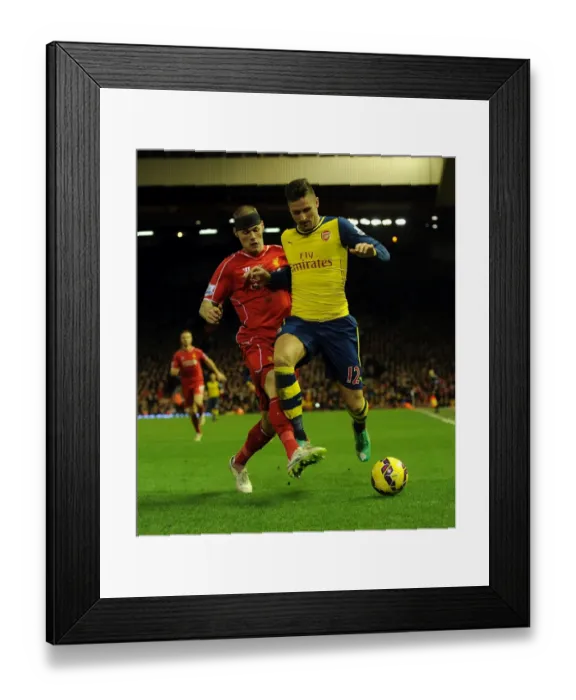 Framed Print : Giroud vs. Skrtel: A Football Rivalry Unfolds at Anfield