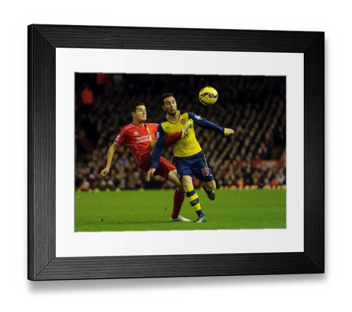 Framed Print : Clash at Anfield: Cazorla vs. Coutinho in the 2014 / 15 Premier League Battle between Liverpool and Arsenal Framed Print : Clash at Anfield: Cazorla vs. Coutinho in the 2014 / 15 Premier League Battle between Liverpool and Arsenal