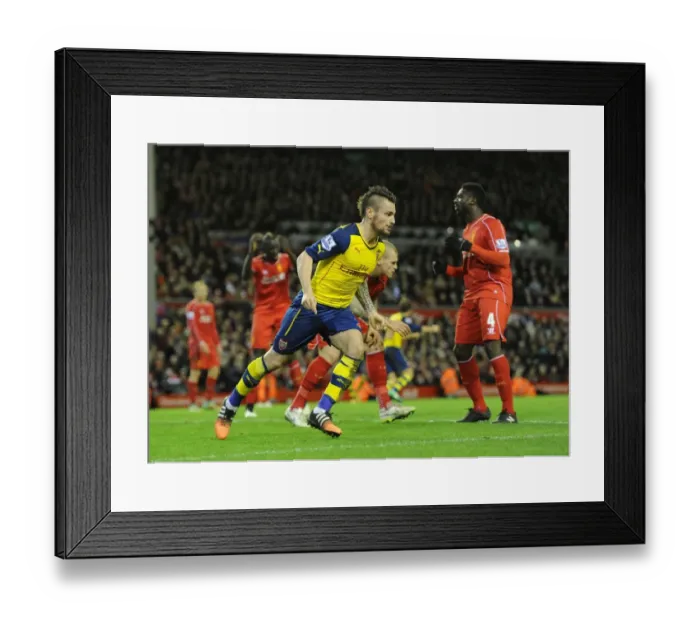 Framed Print : Debuchy's Strike: Arsenal's Triumph Over Liverpool in the Premier League 2014 / 15 Framed Print : Debuchy's Strike: Arsenal's Triumph Over Liverpool in the Premier League 2014 / 15