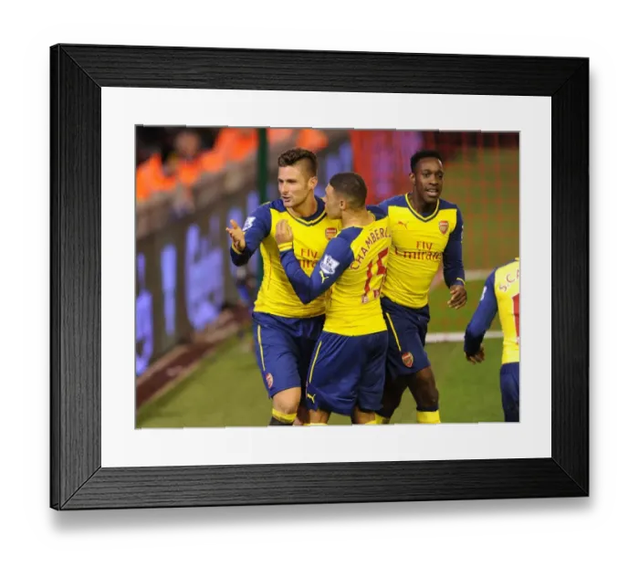 Framed Print : Celebrating Victory: Giroud, Oxlade-Chamberlain, and Welbeck Rejoice After Arsenal's Goals vs. Liverpool (2014 / 15)