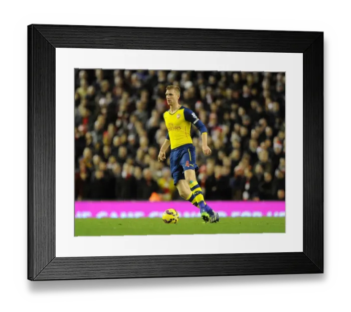 Framed Print : Per Mertesacker at Anfield: Liverpool vs Arsenal, Premier League 2014 / 15
