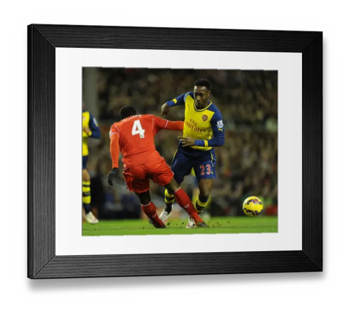 Framed Print : Clash at Anfield: Welbeck vs. Toure - A Football Rivalry Ignites