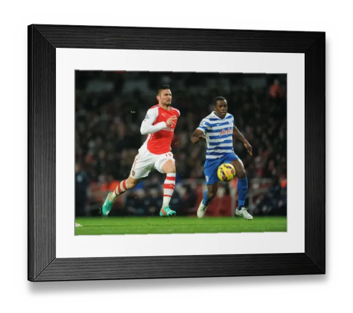 Framed Print : Giroud vs. Onuoha: Intense Battle at the Emirates - Arsenal v Queens Park Rangers, Premier League 2014-15