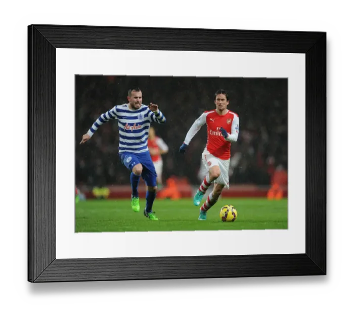 Framed Print : Arsenal's Rosicky Clashes with QPR's Mutch in Premier League Showdown Framed Print : Arsenal's Rosicky Clashes with QPR's Mutch in Premier League Showdown