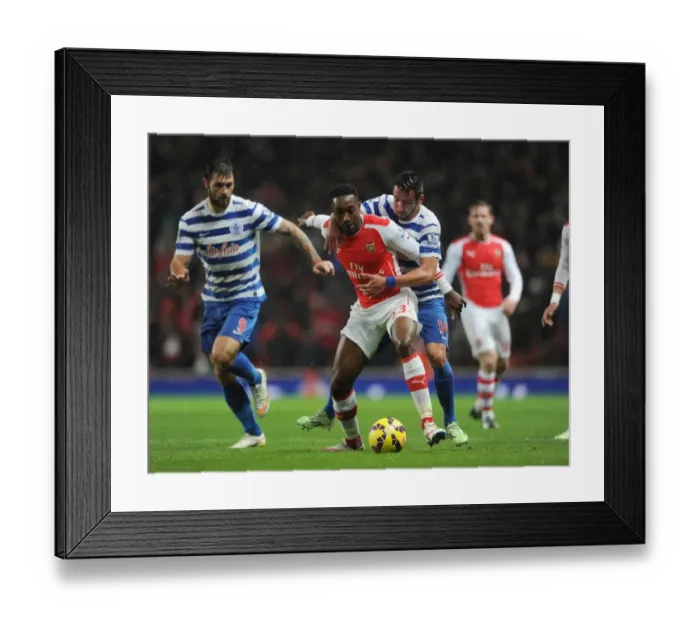 Framed Print : Clash of the Players: Welbeck vs. Isla in Arsenal's Battle with QPR