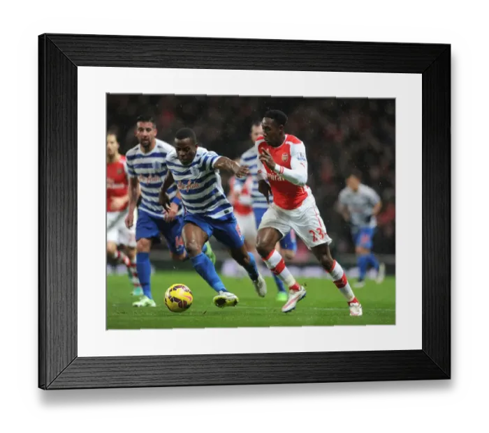 Framed Print : Arsenal's Danny Welbeck Faces Off Against Nedum Onuoha in Premier League Clash Framed Print : Arsenal's Danny Welbeck Faces Off Against Nedum Onuoha in Premier League Clash