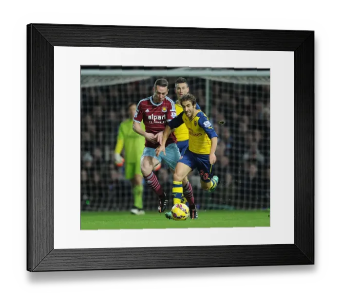 Framed Print : Flamini Surges Past Nolan: Intense Moment from West Ham vs. Arsenal (2014-15)