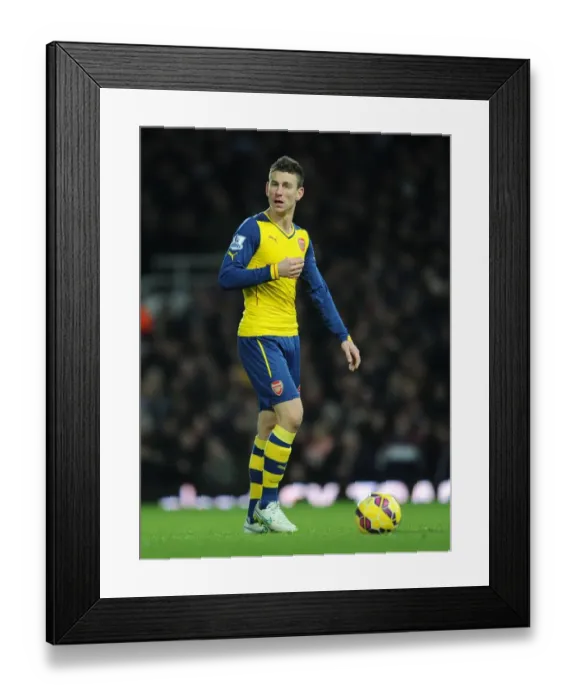 Framed Print : Koscielny in Action: West Ham United vs Arsenal, Premier League 2014-15