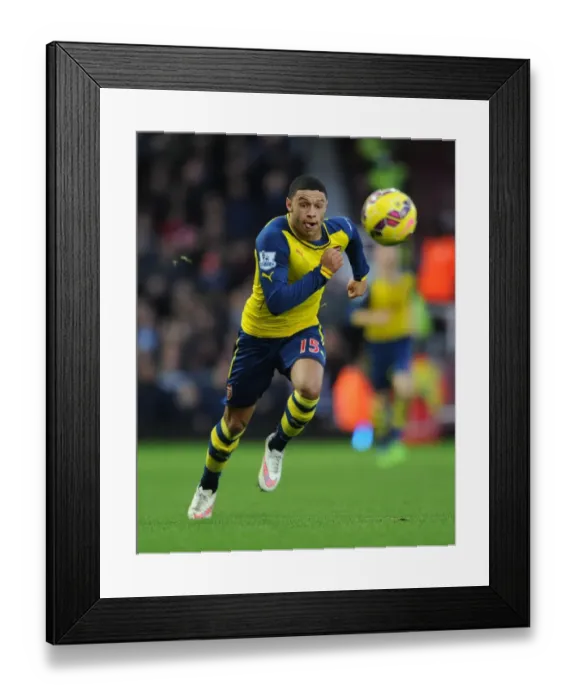 Framed Print : Alex Oxlade-Chamberlain in Action: Arsenal vs West Ham United, Premier League 2014-15 Framed Print : Alex Oxlade-Chamberlain in Action: Arsenal vs West Ham United, Premier League 2014-15