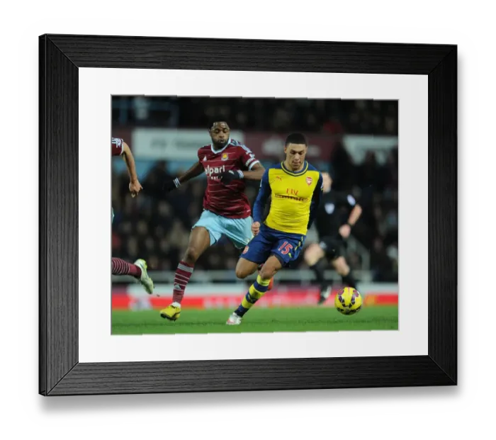 Framed Print : Clash of Midfield Titans: Oxlade-Chamberlain vs. Song (Arsenal vs. West Ham, 2014-15)
