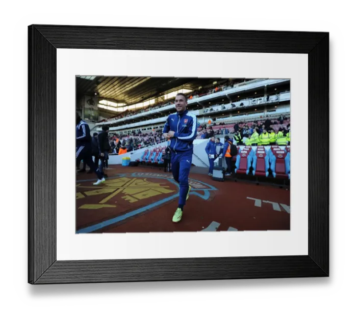 Framed Print : Lukas Podolski (Arsenal). West Ham United 1: 2 Arsenal. Barclays Premier League. The Boleyn Ground