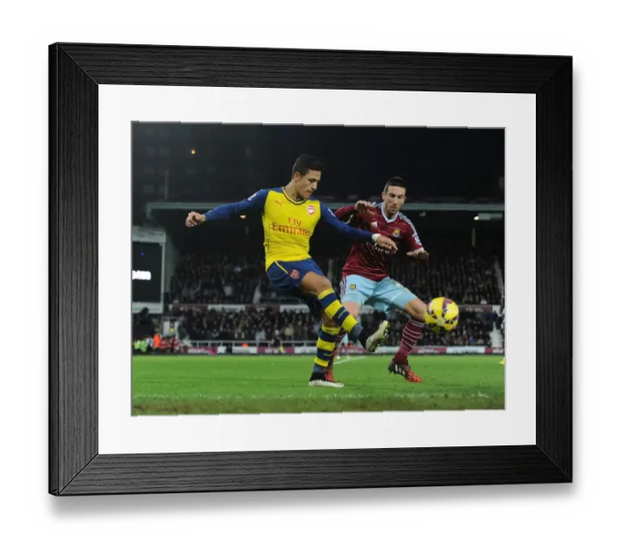 Framed Print : Clash at the Boleyn: Sanchez Faces Off Against Amalfitano in Premier League Showdown Framed Print : Clash at the Boleyn: Sanchez Faces Off Against Amalfitano in Premier League Showdown