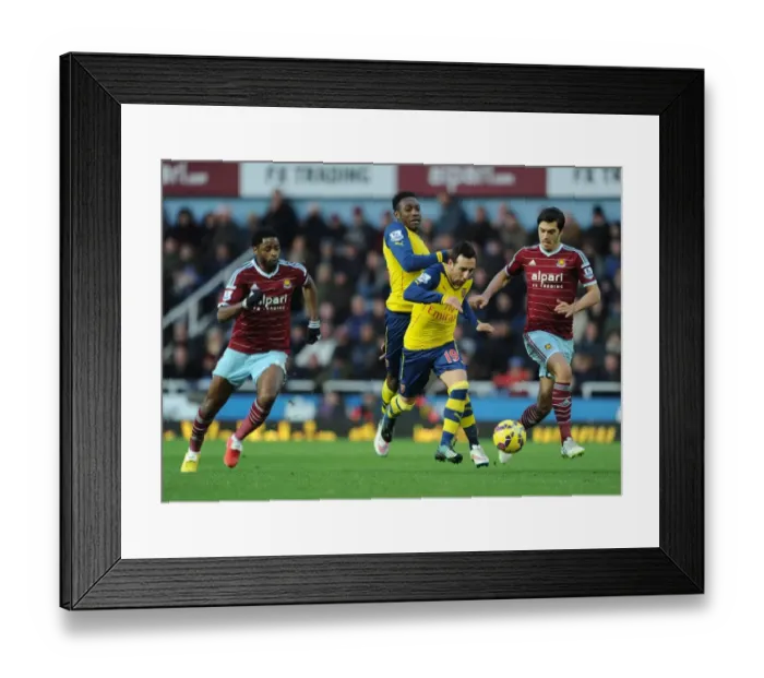 Framed Print : Intense Rivalry: Cazorla and Welbeck vs. Song and Tomkins at the Boleyn Ground Framed Print : Intense Rivalry: Cazorla and Welbeck vs. Song and Tomkins at the Boleyn Ground
