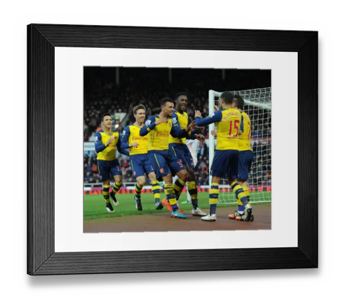 Framed Print : Celebrating Victory: Welbeck, Coquelin, and Oxlade-Chamberlain Rejoice After Arsenal's Goals vs. West Ham United (2014-15)