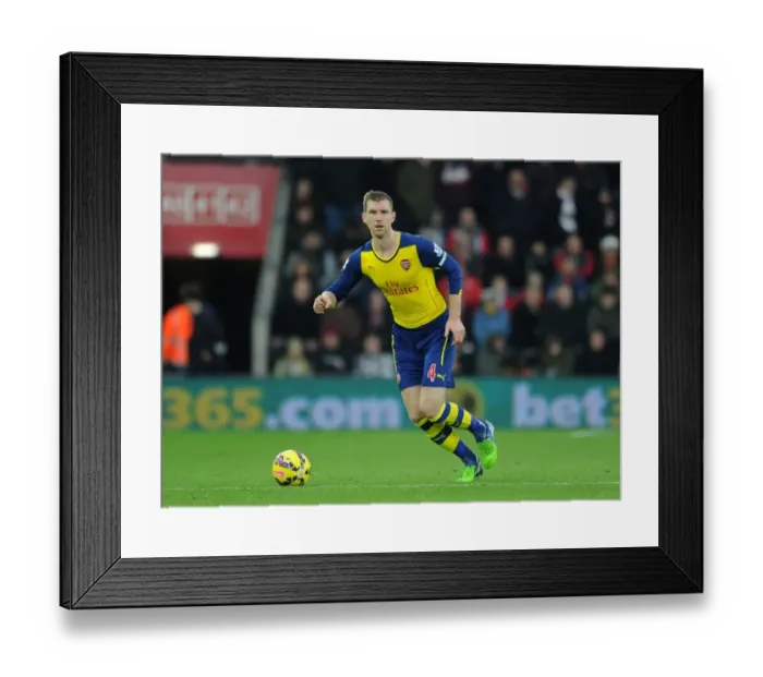 Framed Print : Per Mertesacker of Arsenal in Action against Southampton in the 2014-15 Premier League