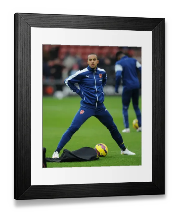 Framed Print : Theo Walcott's Pre-Match Routine: Southampton vs. Arsenal, Premier League 2014-15