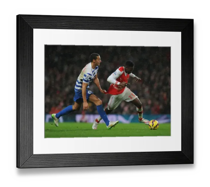 Framed Print : Tense Clash: Welbeck vs. Ferdinand at Arsenal vs. QPR Framed Print : Tense Clash: Welbeck vs. Ferdinand at Arsenal vs. QPR