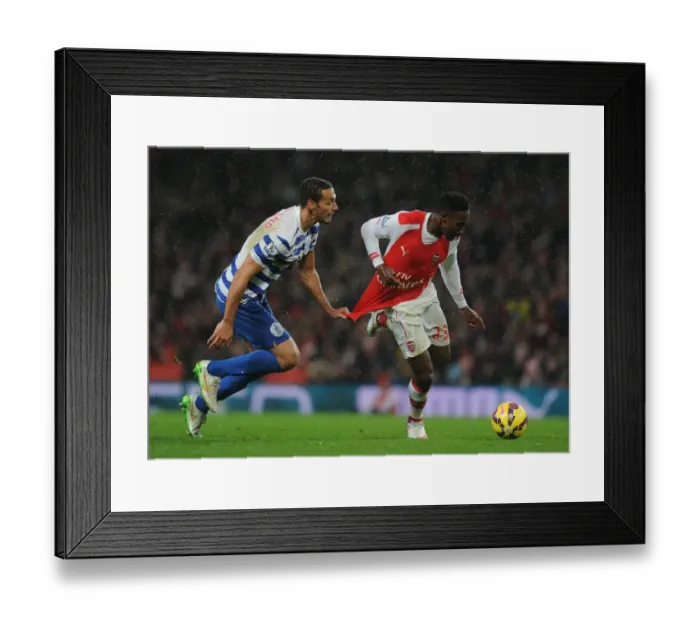 Framed Print : Tense Rivalry: Welbeck vs. Ferdinand Clash at Arsenal vs. QPR