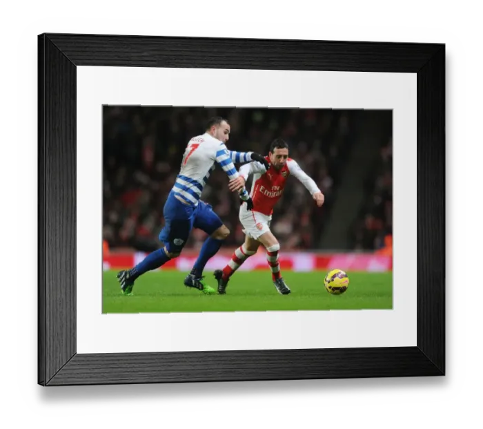 Framed Print : Clash at Emirates: Cazorla vs. Mutch in Arsenal vs. QPR Showdown Framed Print : Clash at Emirates: Cazorla vs. Mutch in Arsenal vs. QPR Showdown