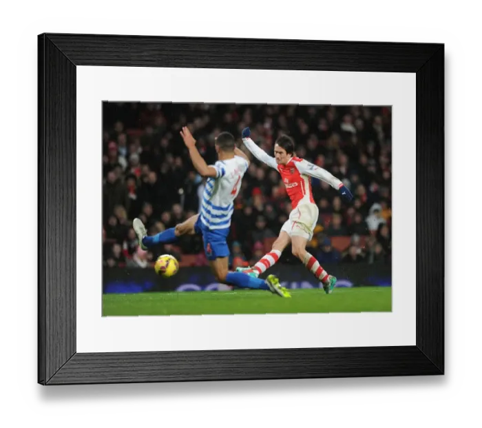 Framed Print : Arsenal vs. Queens Park Rangers: Premier League Battle at Emirates Stadium (December 2014)