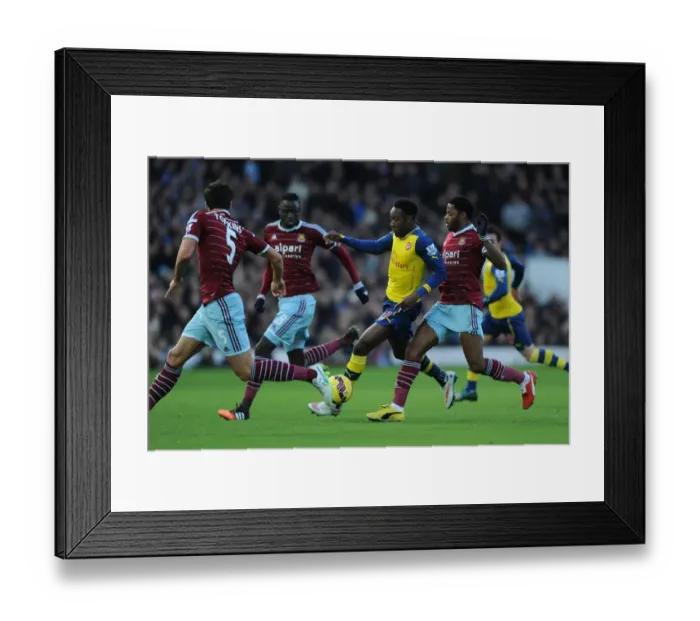 Framed Print : Welbeck vs. West Ham: Intense Battle at the Boleyn Ground (Arsenal vs. West Ham, Premier League 2014-15)