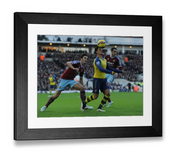 Framed Print : Sanchez vs. Tomkins: A Premier League Showdown at Boleyn Ground