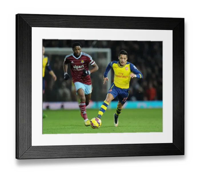 Framed Print : Alexis Sanchez Breaks Past West Ham's Song: Arsenal vs. West Ham United, Premier League 2014-15