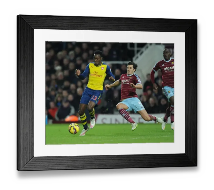 Framed Print : Clash at the Boleyn: Welbeck vs. Tomkins in the 2014-15 West Ham United vs. Arsenal Premier League Battle