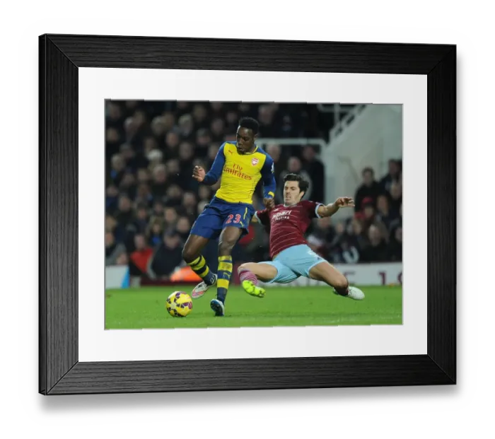Framed Print : Clash at the Boleyn: Welbeck vs. Tomkins in the West Ham United vs. Arsenal Premier League Battle Framed Print : Clash at the Boleyn: Welbeck vs. Tomkins in the West Ham United vs. Arsenal Premier League Battle